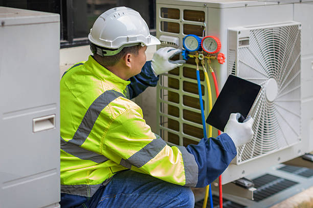 Professional Emergency Ac Repair technician working in Flanders, NY